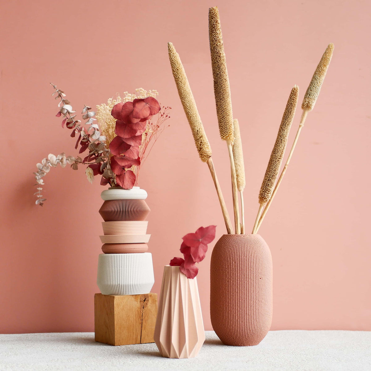 Terracotta AMA vase styled with other modular vases – warm and modern aesthetic