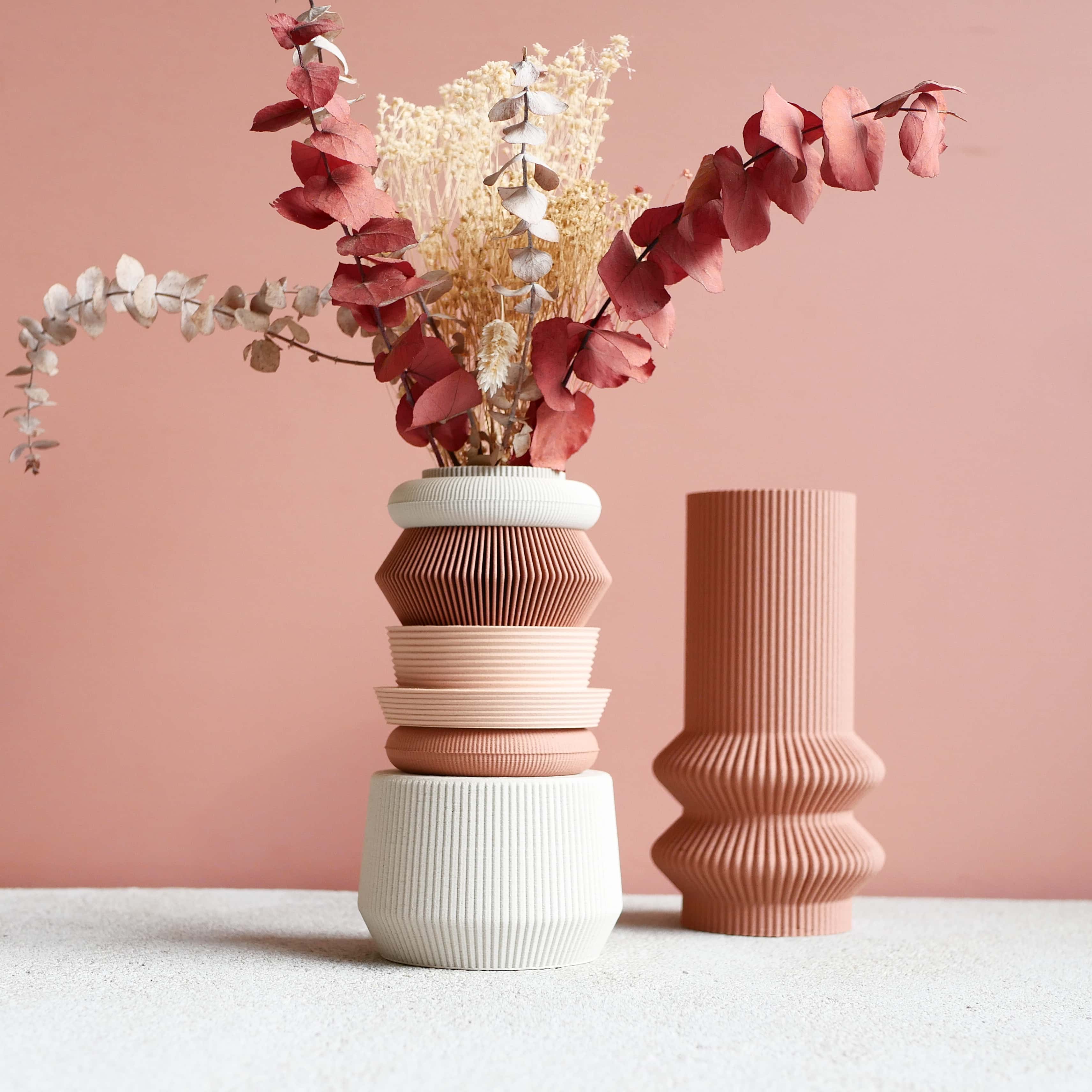 Blush pink AMA vase among terracotta design vases – Minimum Design collection