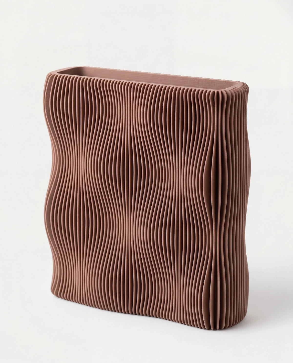 TIDE sculptural vase Terracotta 22cm standalone, fine wave-ribbed texture, matte terracotta finish, made in France