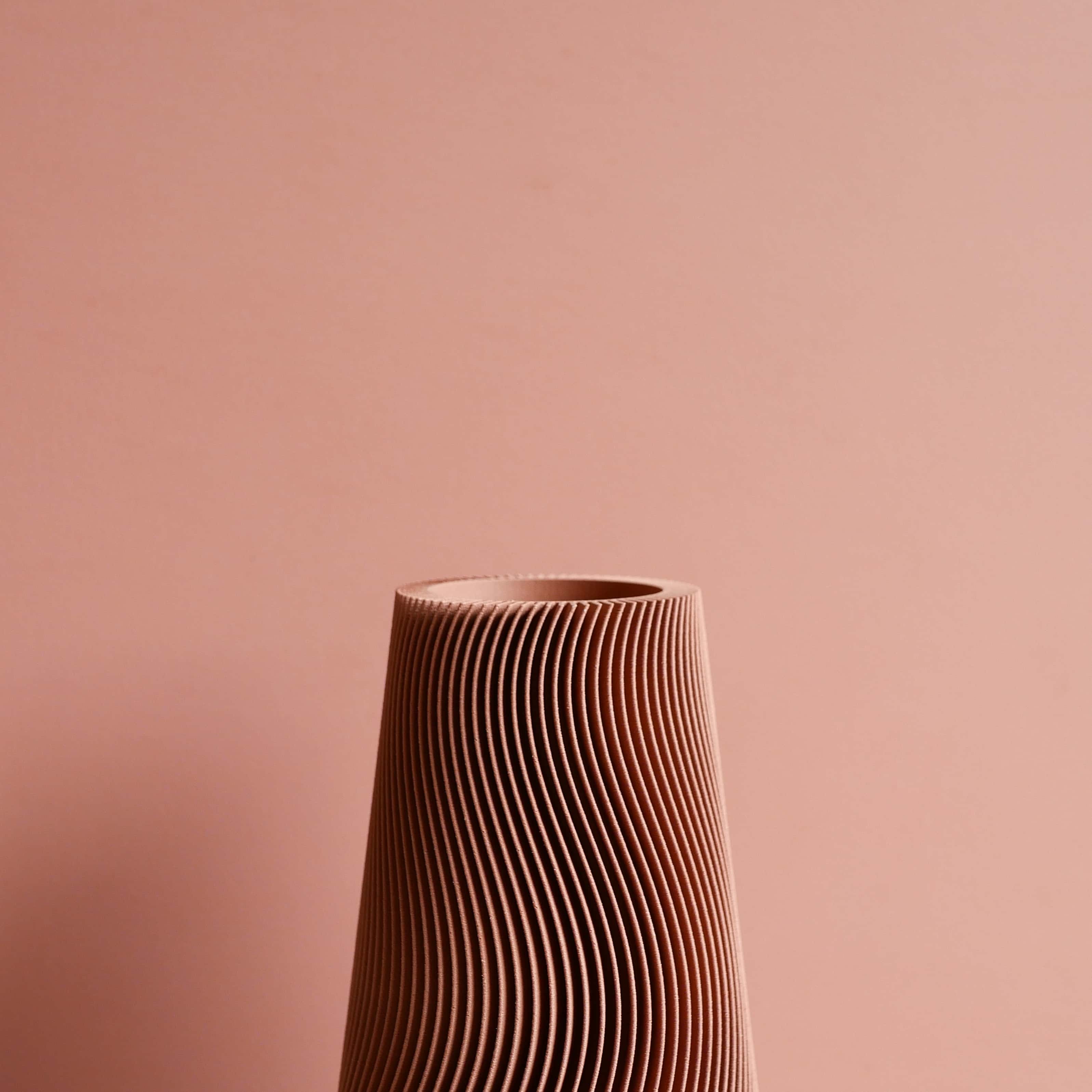 Focus on the details of the Wave Vase in terracotta color - Minimum Design #color_Terracotta