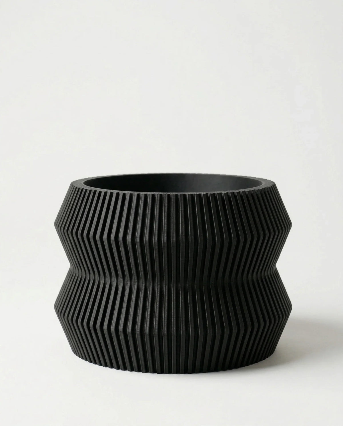 Black textured planter 15cm on a white background