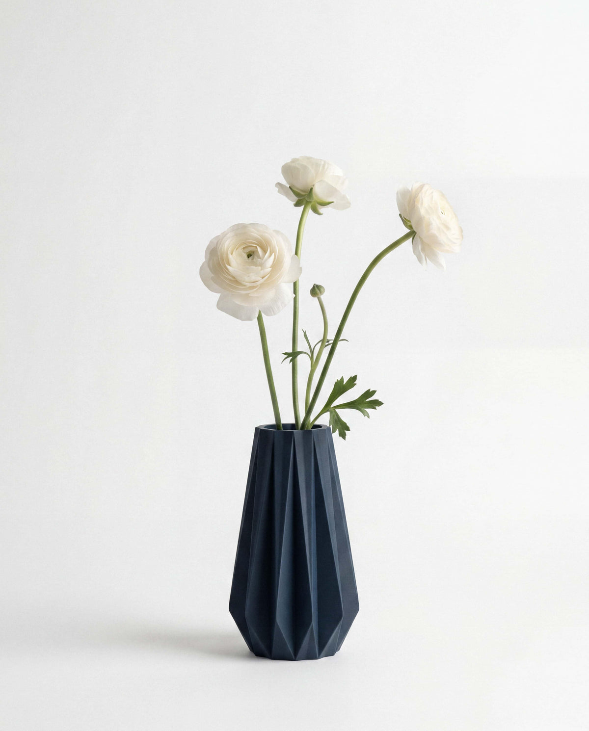 Navy Blue origami vase with dried flower stems - minimalist scandinavian decor