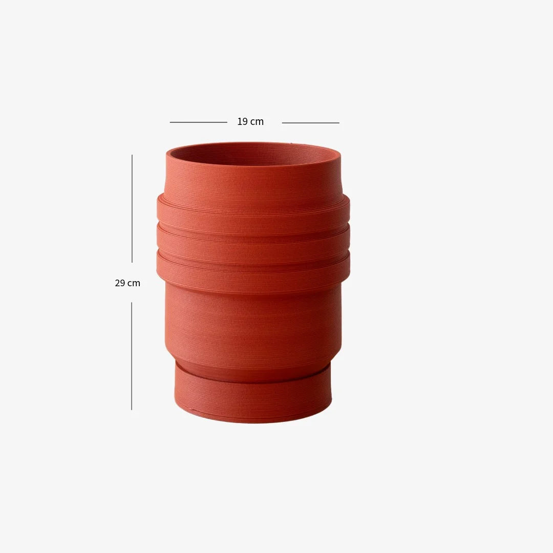Red cylindrical pot with dimensions on a white background