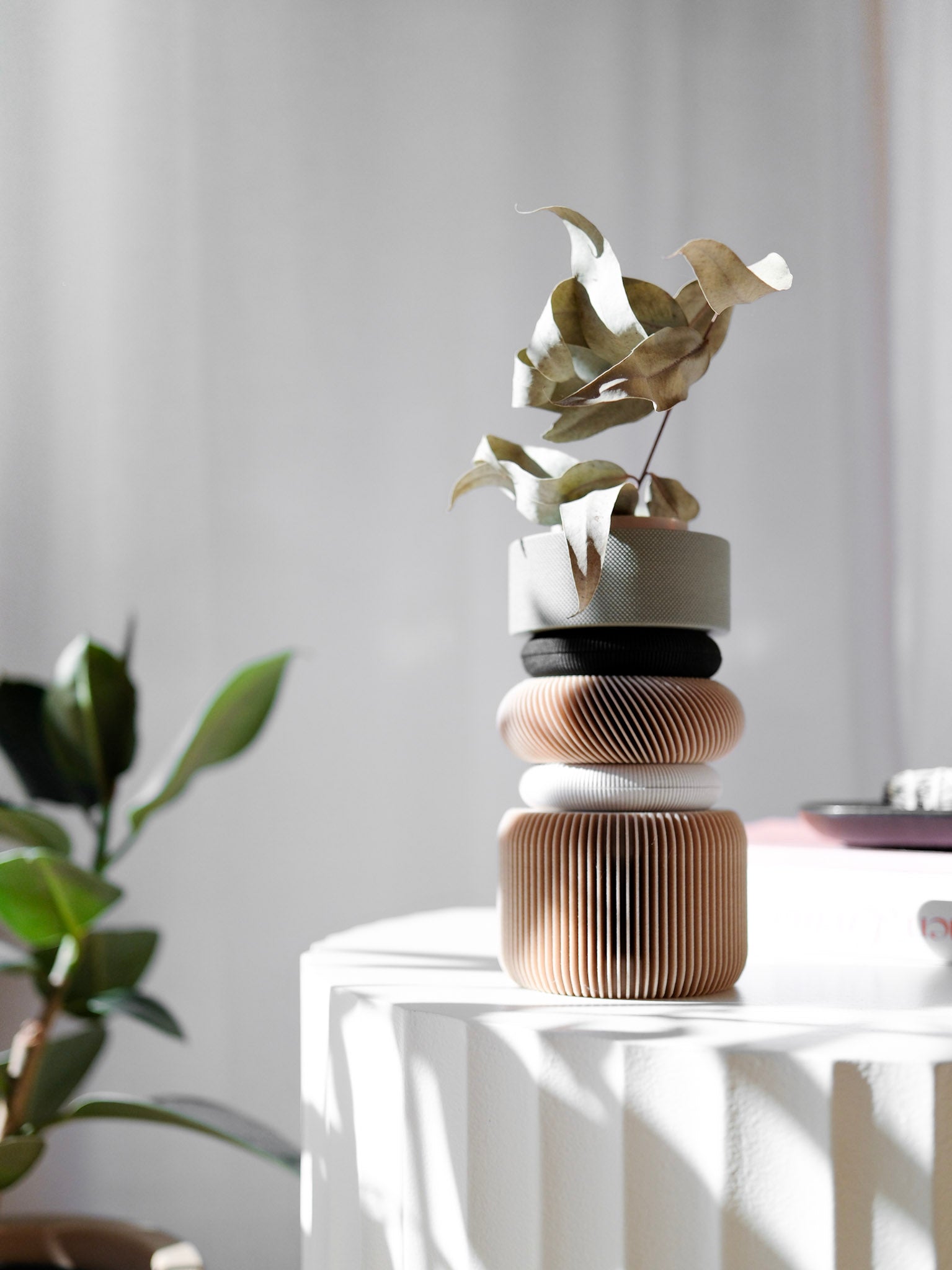 Vase Nu Olive Green on a white table Minimum design