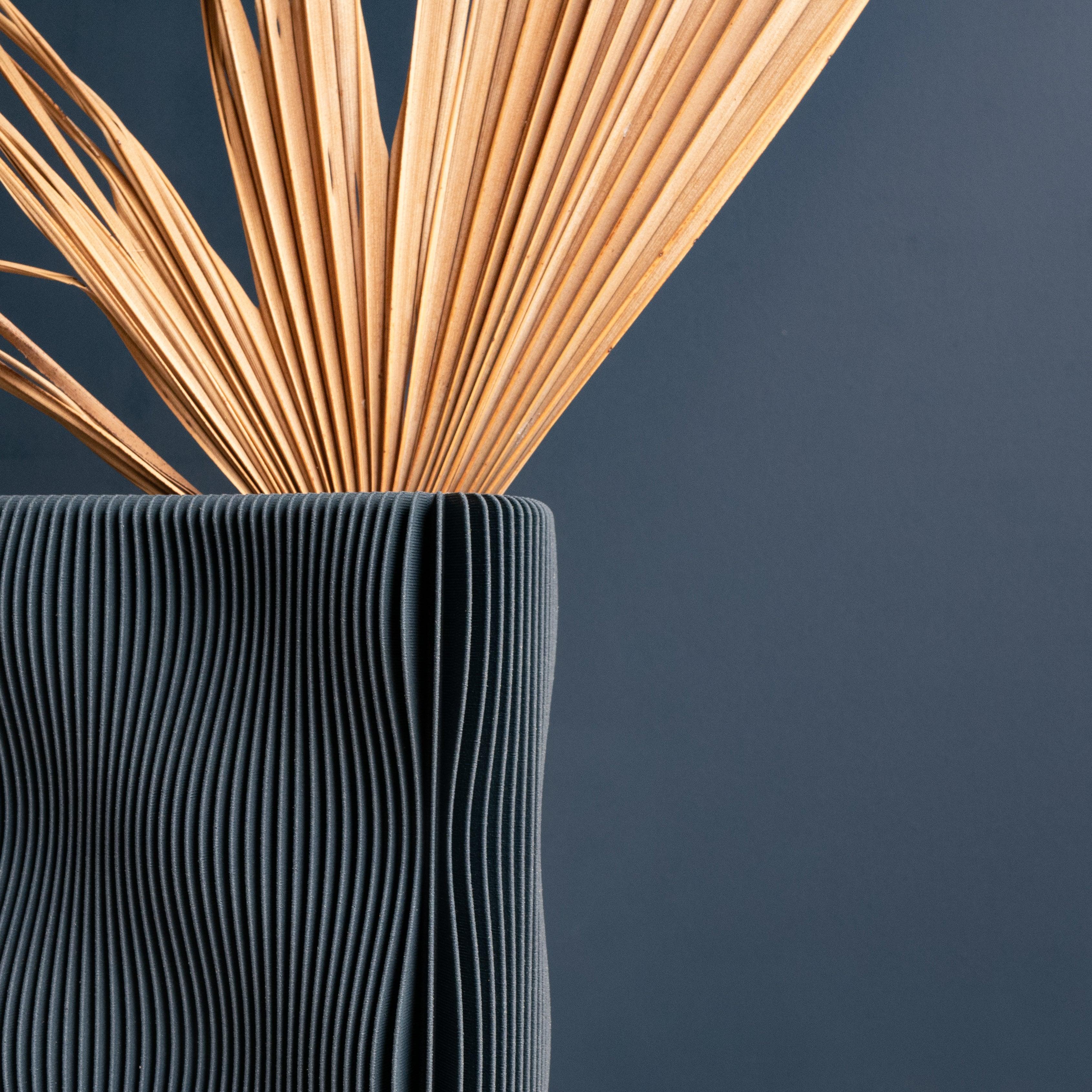 Close-up on the detail and the texture of the deep blue TIDE Vase - Minimum Design #color_blue