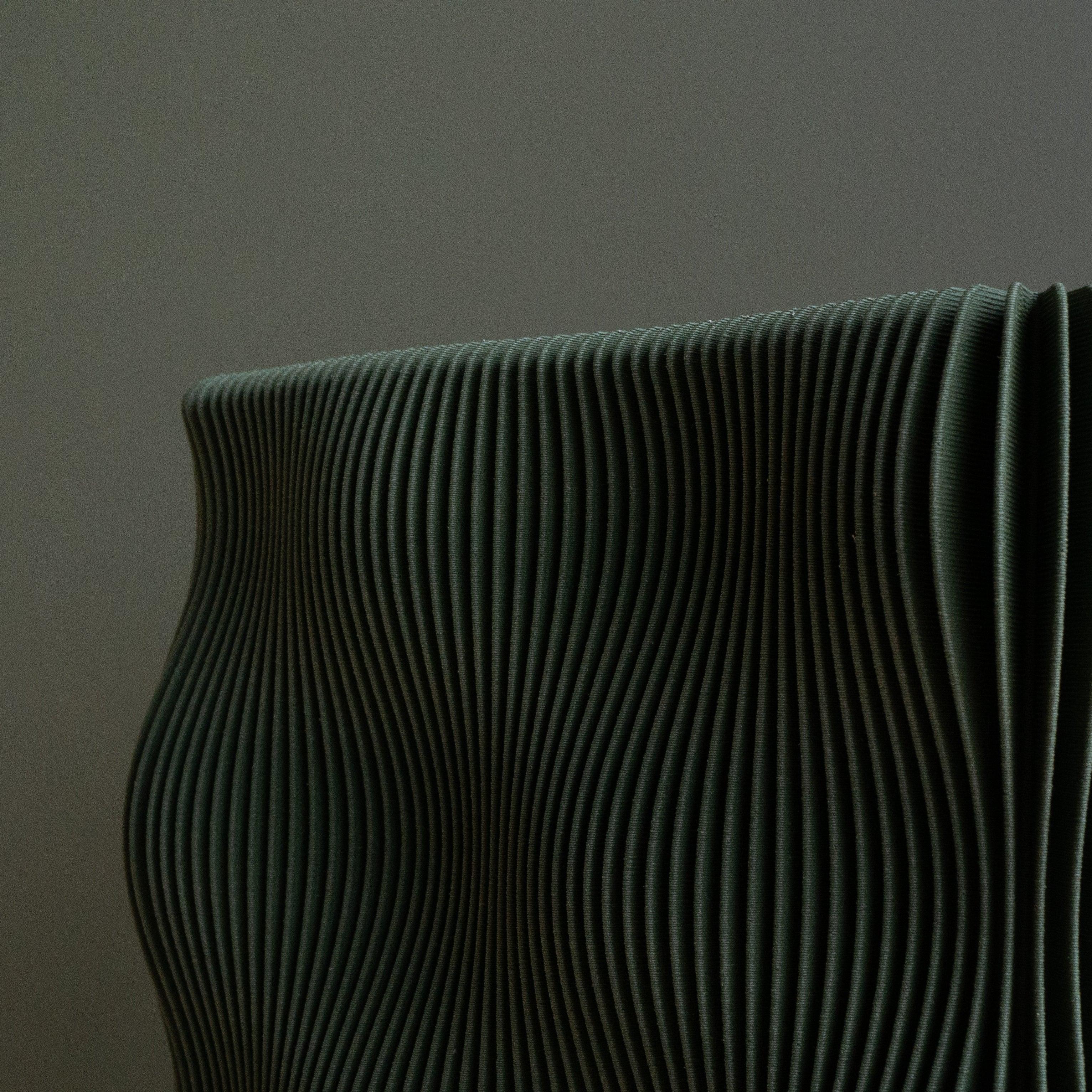 Close up on the green TIDE Vase - sleek design - Minimum Design #color_green