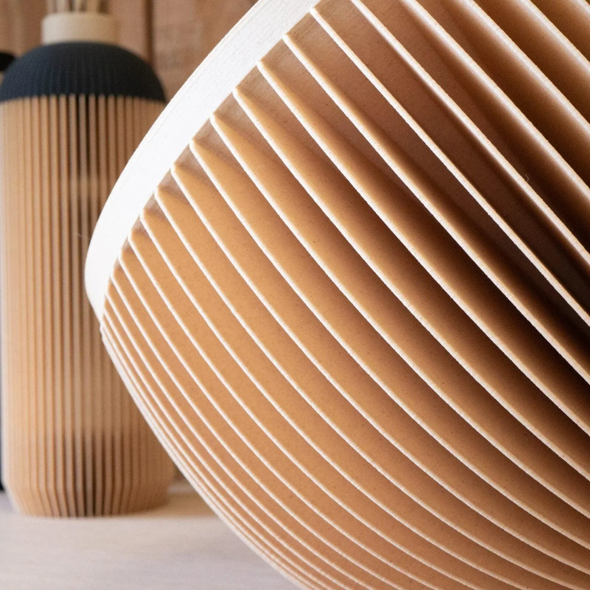 Close-up of the sustainable wood bio-material texture of the Sunset lamp