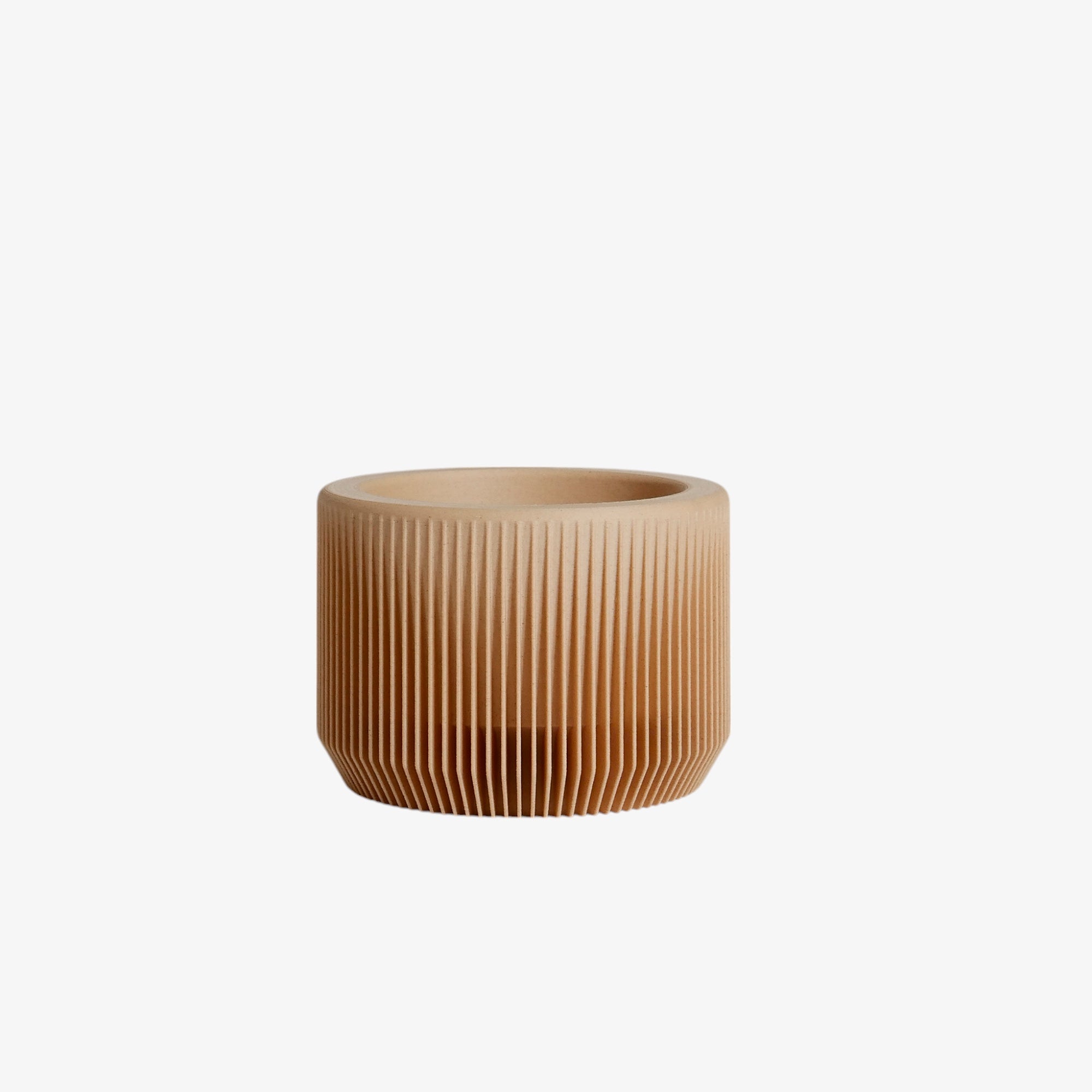 The Praha planter in beige – a soft, natural shade that highlights the delicate greens of your plants, blending seamlessly with any decor #color_Natural