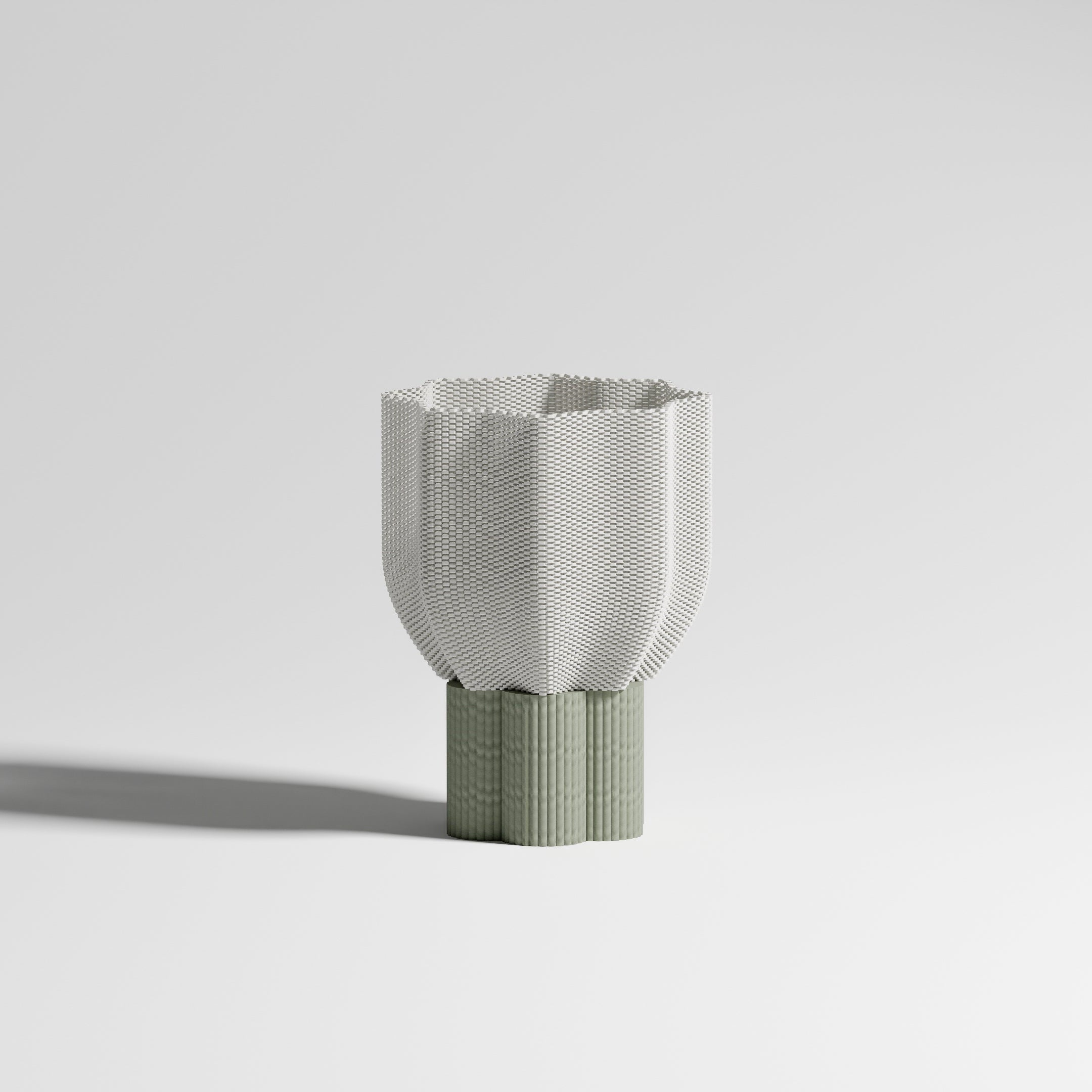 Bloom lamp with olive green base on white background. Floral shade in biobased material. Minimalist and sustainable design.