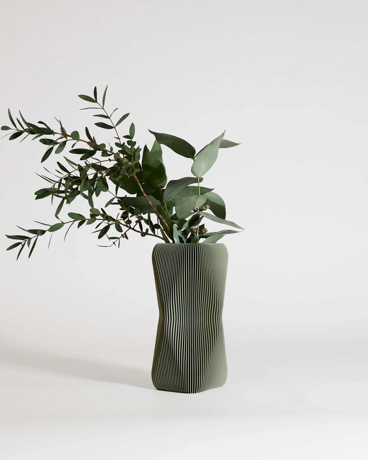 SOHO sculptural vase Olive with fresh olive and eucalyptus branches, grey-green matte finish, 20cm