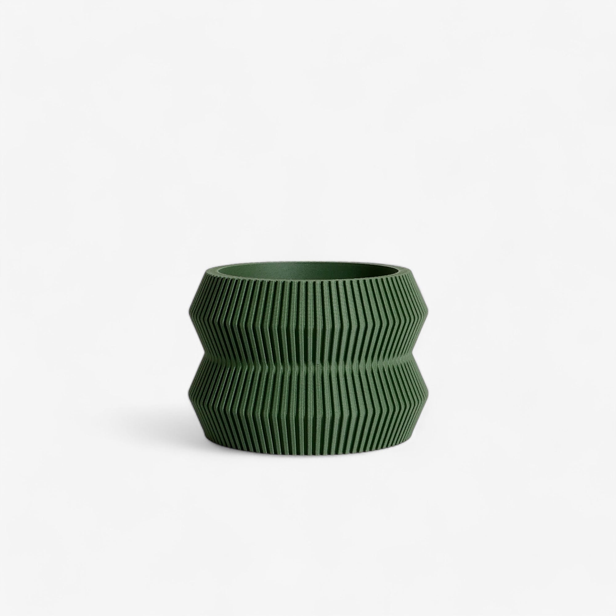 Minimalist green ITO planter with a distinctive textured finish, ideal for succulents and cacti, adding a fresh, modern look to your space #color_green