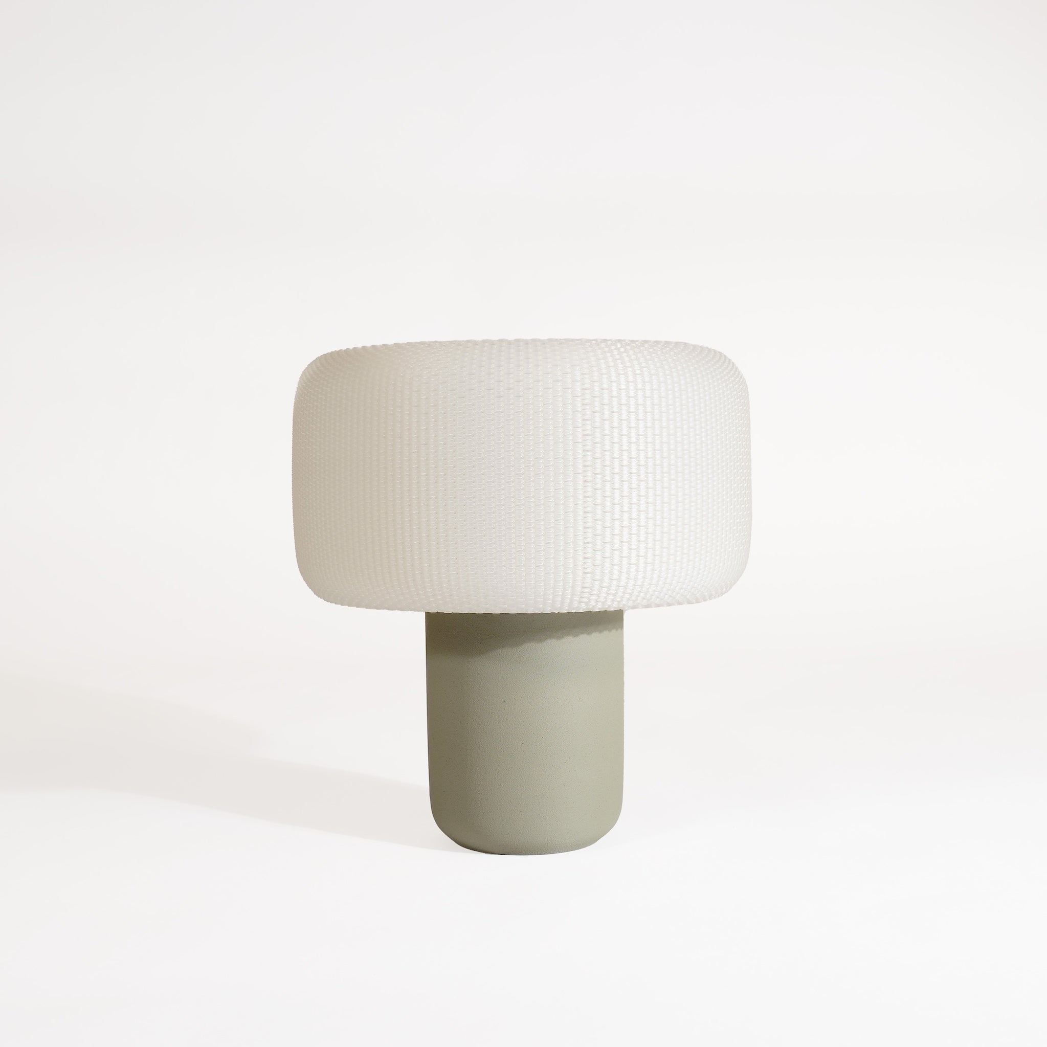 Small table lamp with a white shade and green base on a white background #color_olive