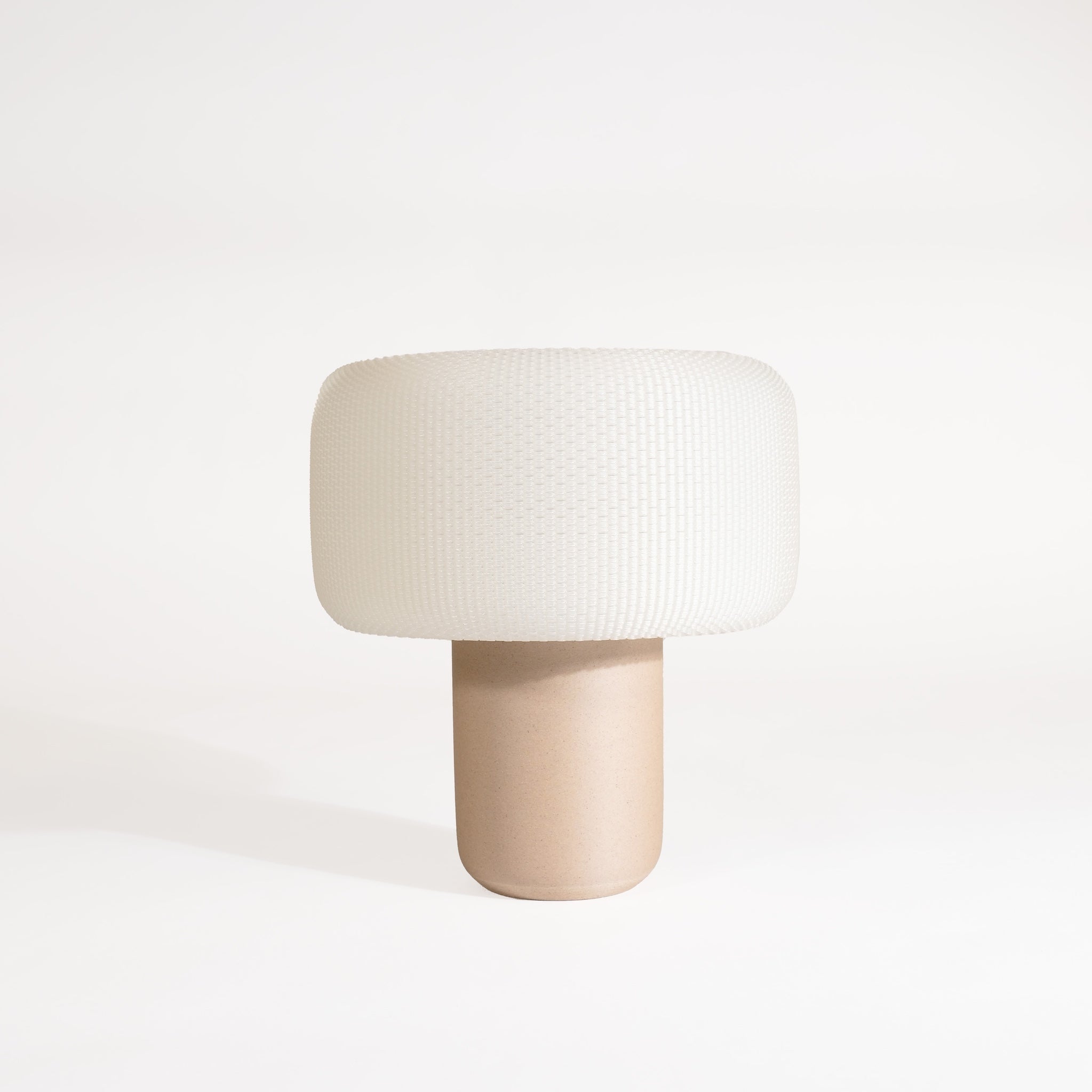 Minimalist table lamp with a white shade and wooden base on a white background #color_natural