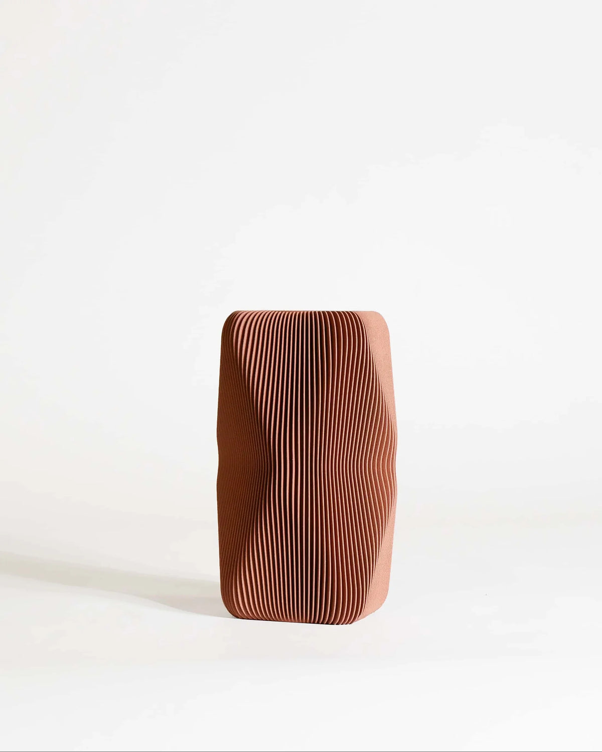 SOHO vase Terracotta side view, organic twisted form, ribbed surface detail, 20cm, Minimum Design