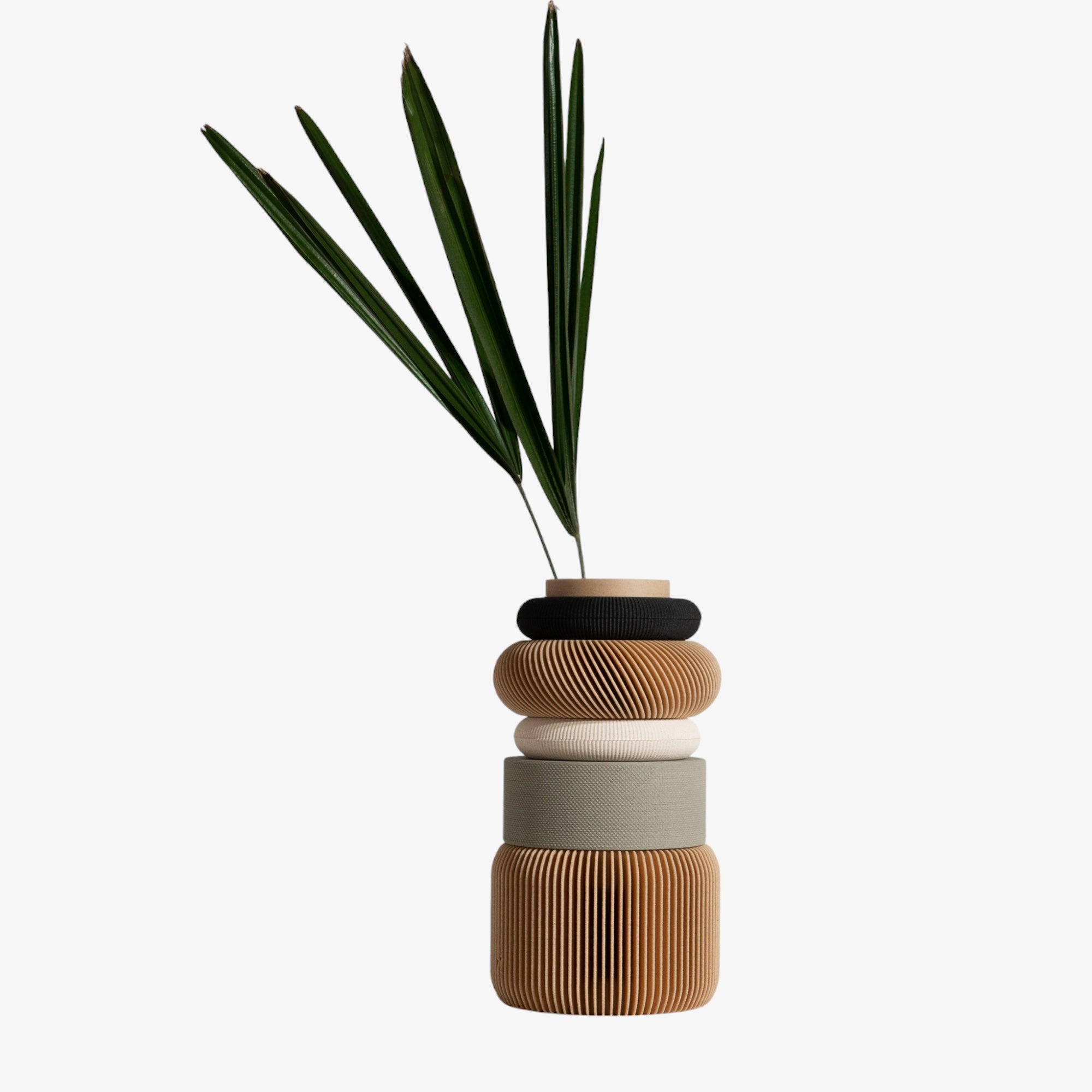 Eco-Friendly Modular Vase with Waterproof Insert - Perfect for Fresh Flowers"
The Nu Vase includes a waterproof insert, making it ideal for fresh flowers. Shown here with greenery, the vase blends style and sustainability in an elegant olive shade