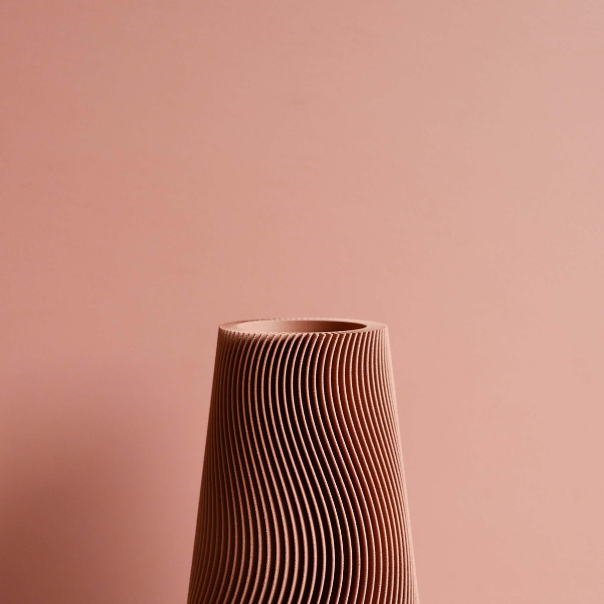 Wave vase terracotta close-up texture detail - handcrafted organic design