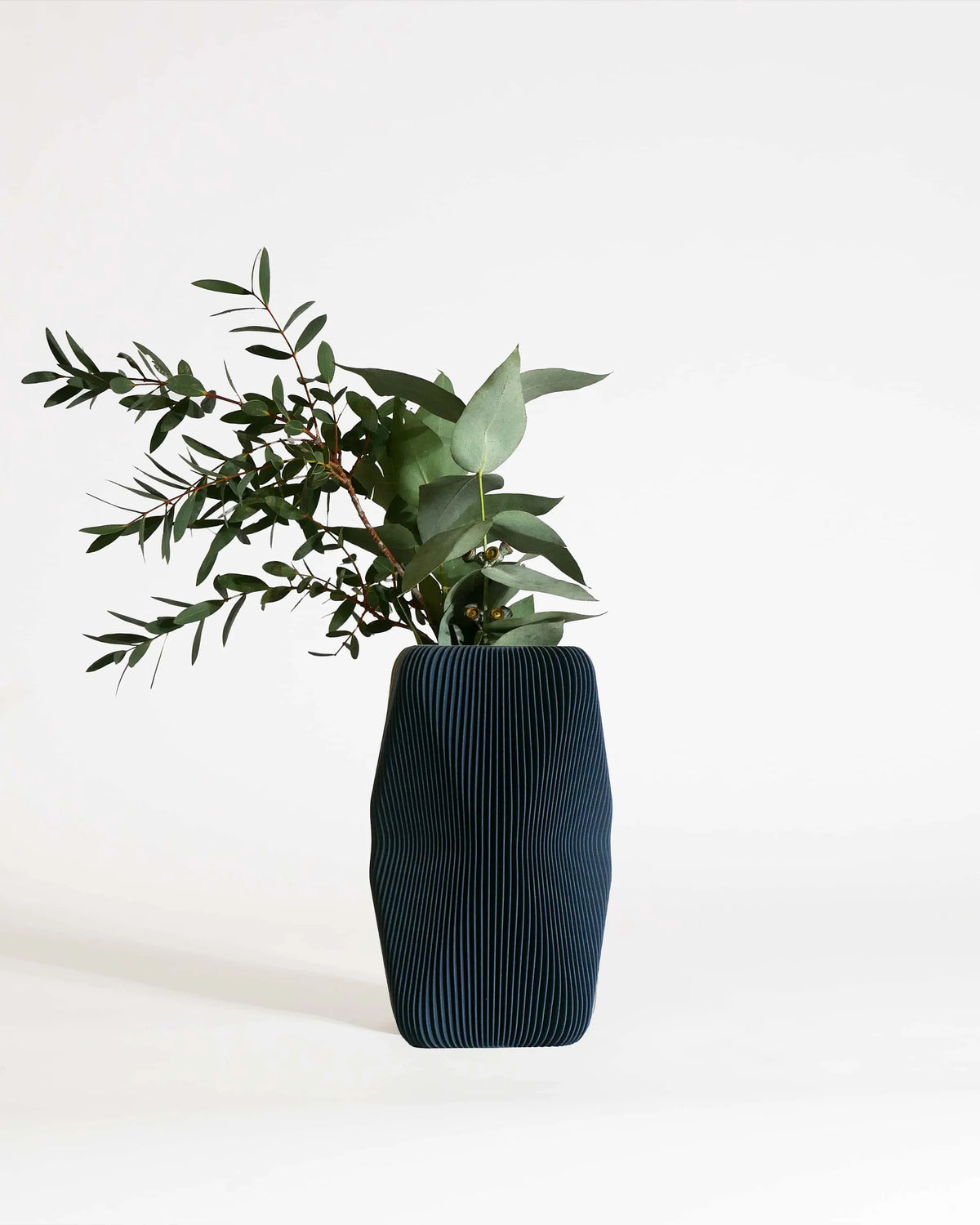 SOHO sculptural vase Blue with fresh olive branches, petrol blue matte finish, 20cm, made in France