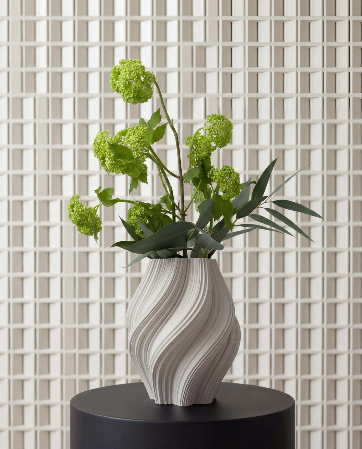Crease white vase with plant - interior decoration