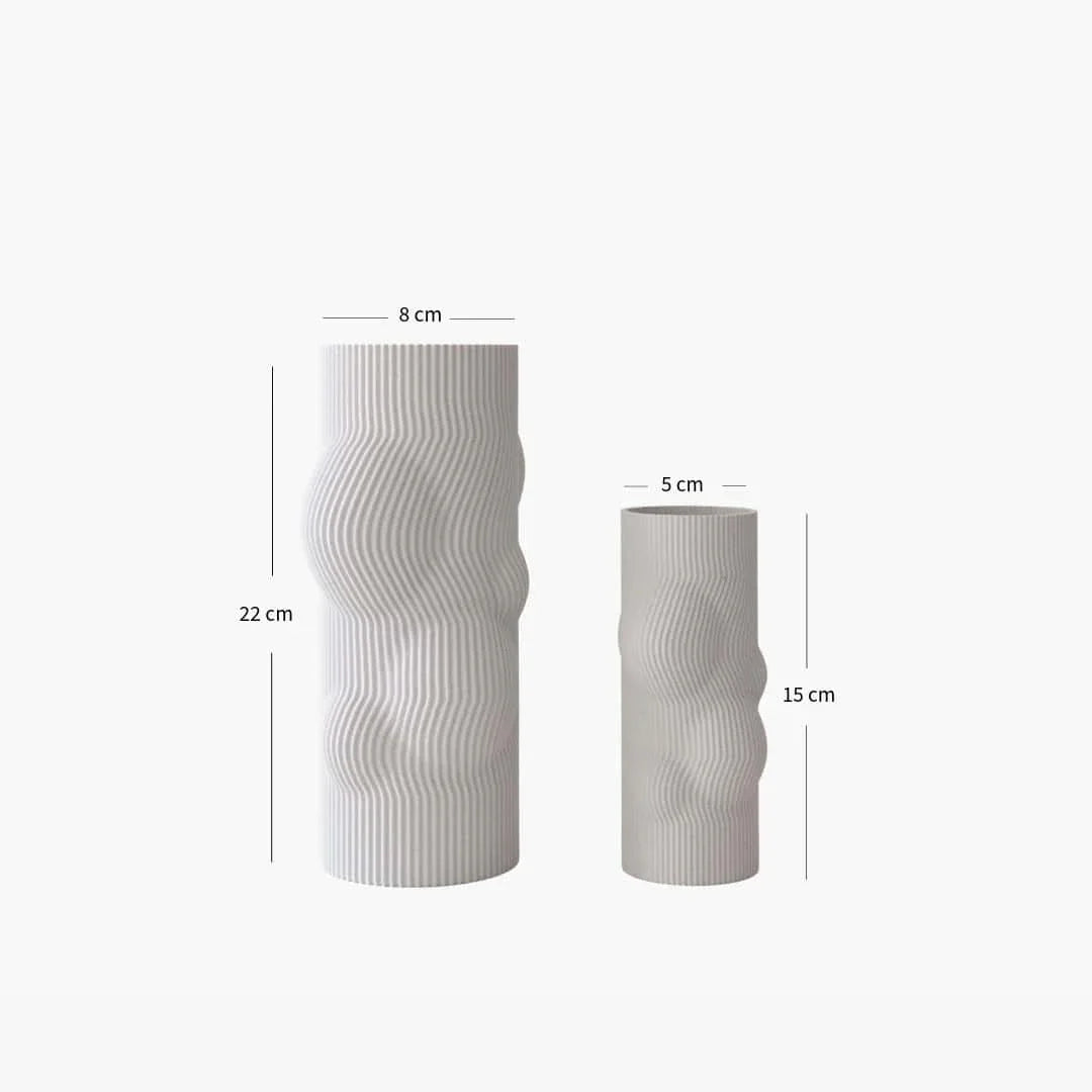 Two cylindrical vases with measurements on a white background
