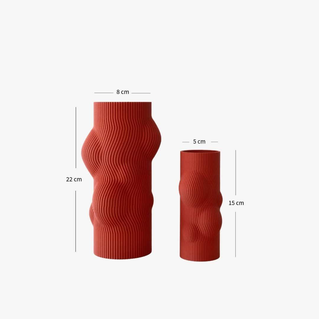 Red textured vase with measurements on a white background