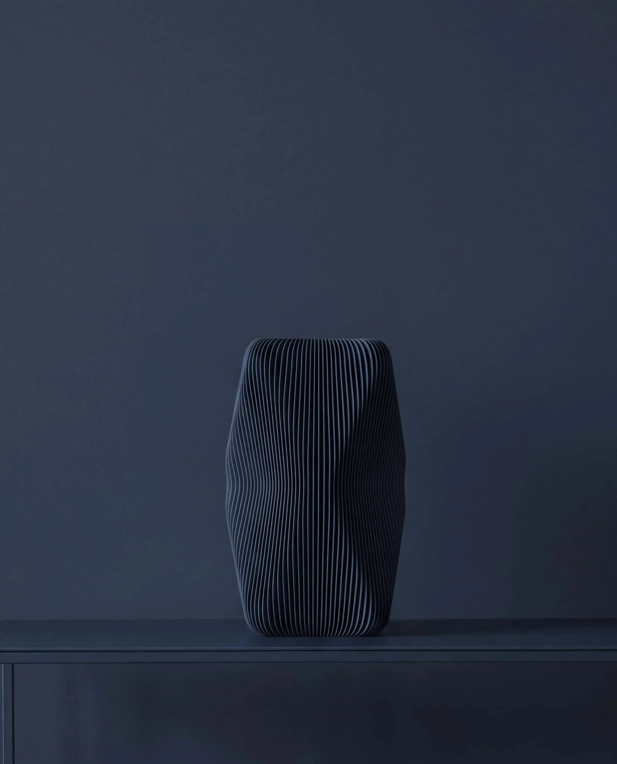 Soho sculptural vase petrol blue - wood grain texture detail on dark background