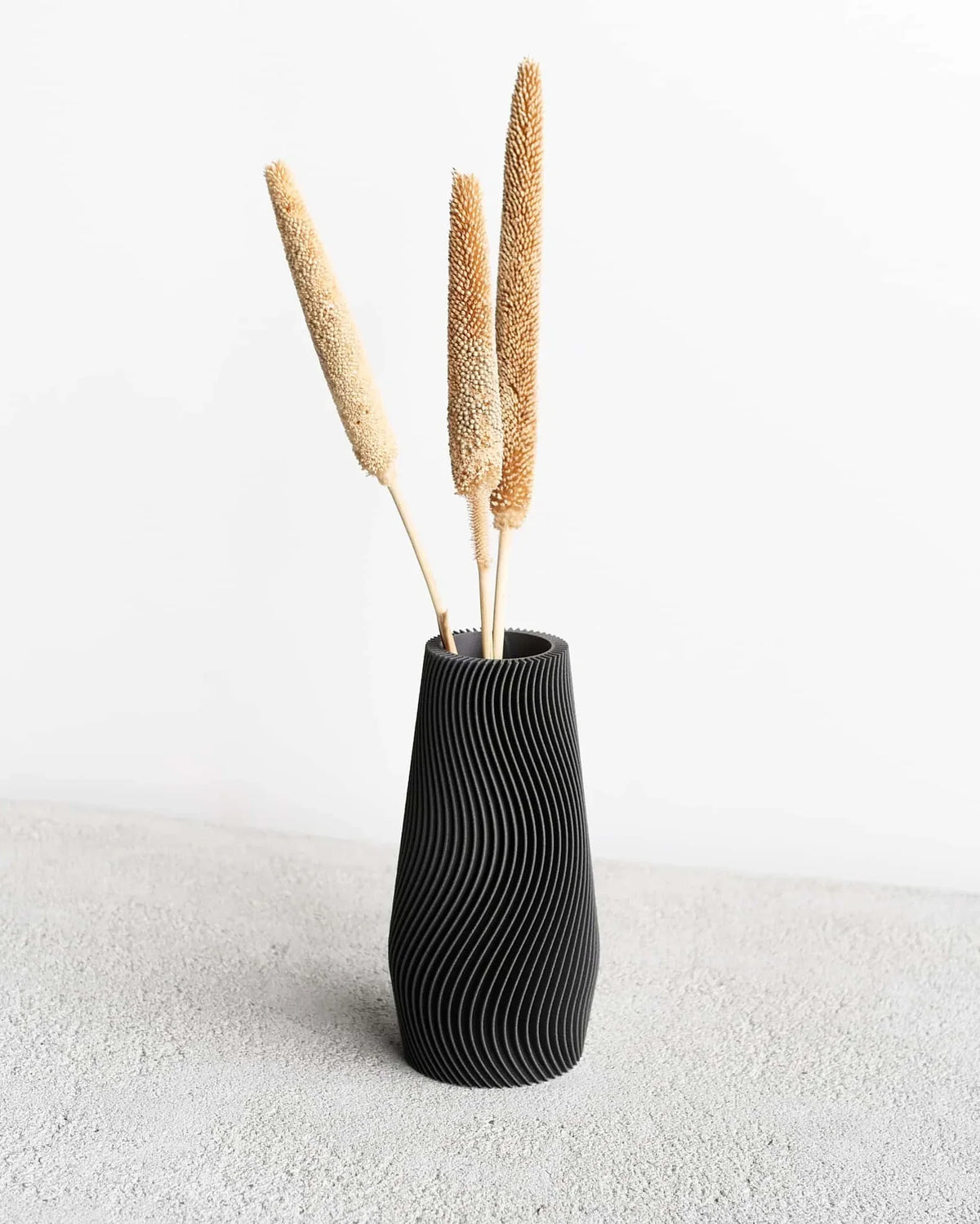 Dark grey wave vase with dried pampas stems - minimalist nordic decor